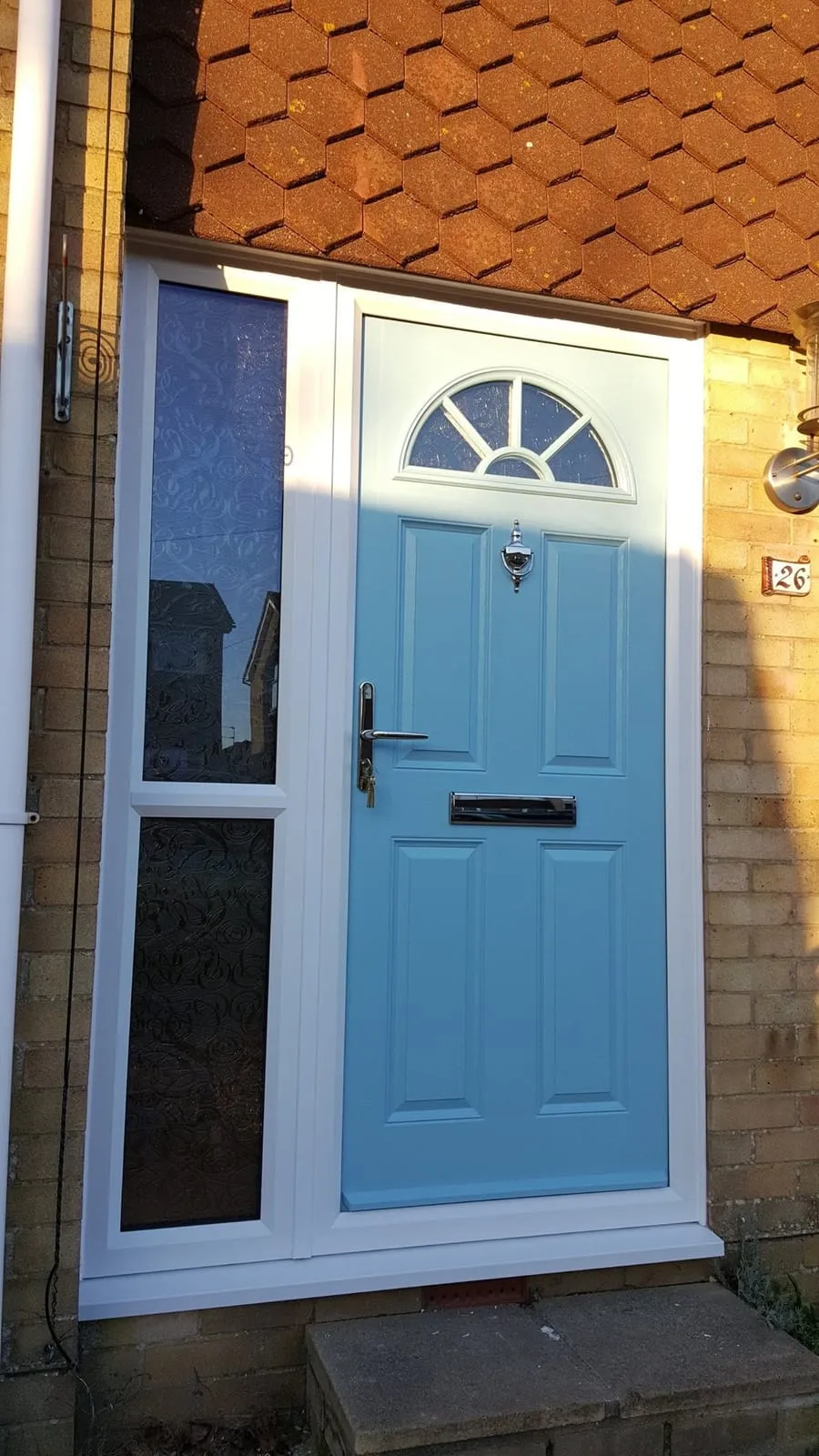 Blue composite front door with decorative glazing Everglaze Window Solutions Portsmouth