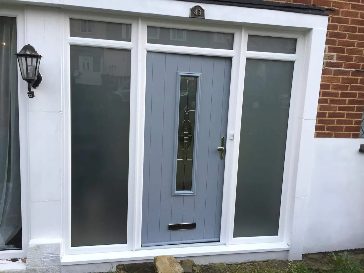 Grey composite door with glazed side panels Everglaze Window Solutions Portsmouth