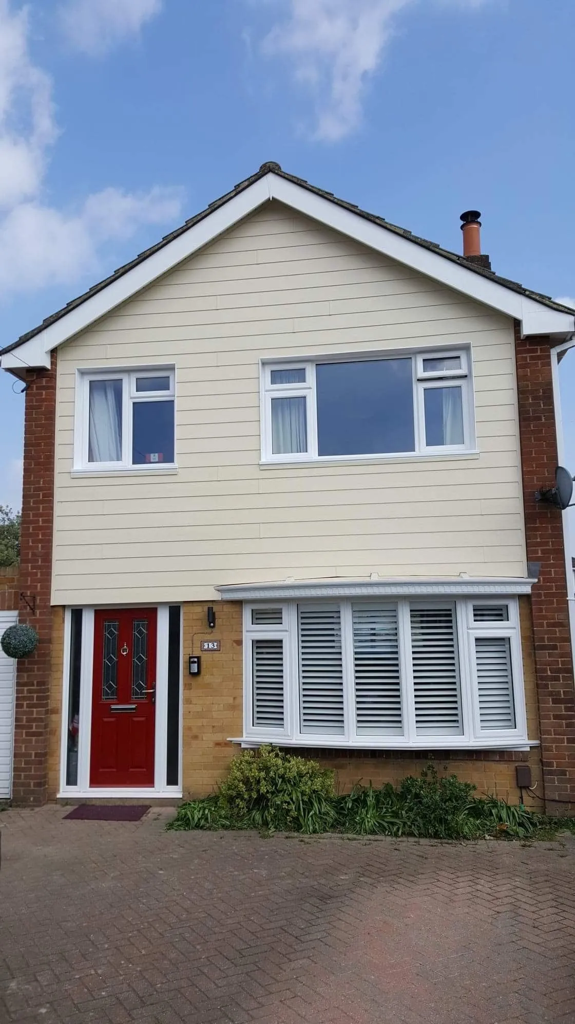White uPVC bay window on a rendered wall Everglaze Window Solutions Portsmouth